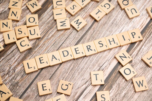 The word "Leadership" spelled using Scrabble titles